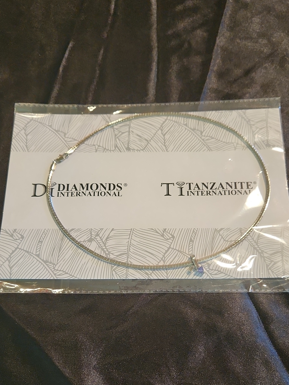 Diamonds international tanzanite necklace